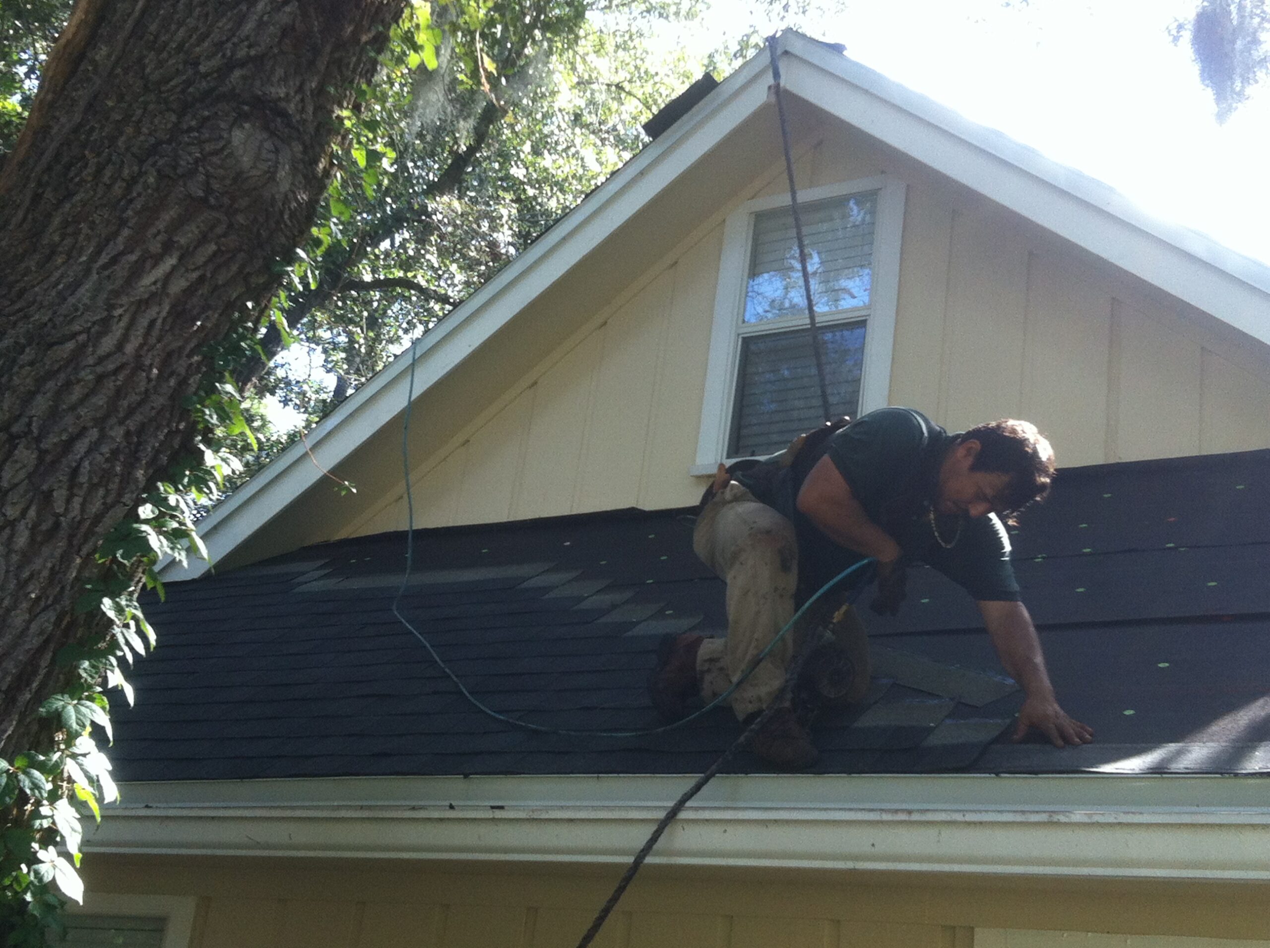 Expert United Roofing technician inspecting a roof for maintenance in Ocala, FL