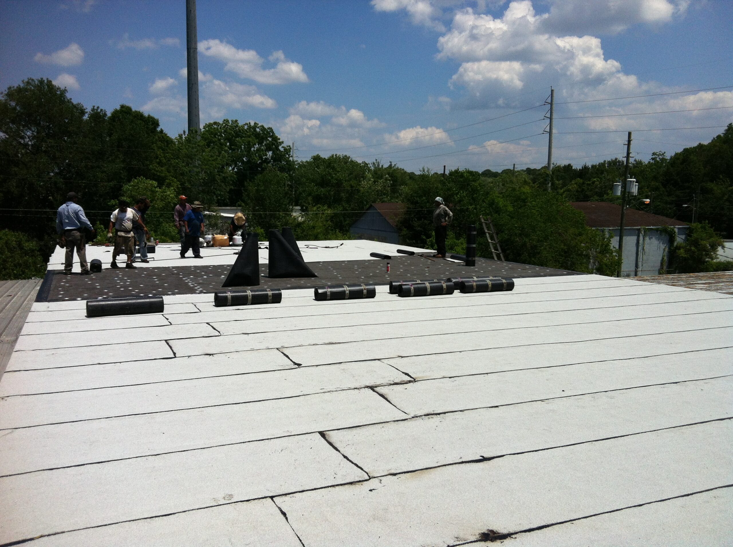 Expert roofing team at United Roofing enhancing a Ocala, FL, home's value and safety, Certified roofing professionals from United Roofing efficiently working on a roof in Silver Springs Shores, showcasing their expertise and commitment to quality.