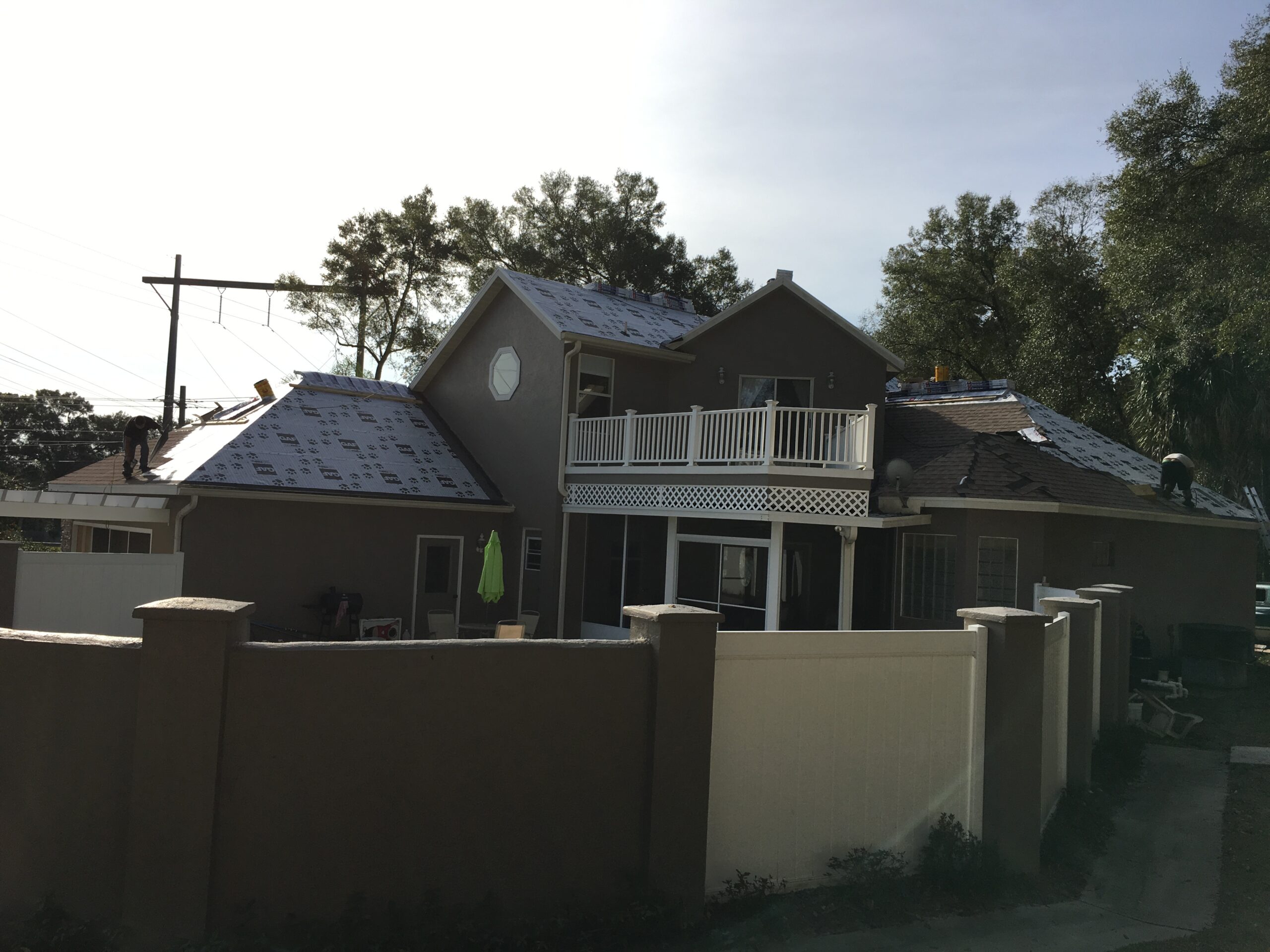 Expert roofing technician applying high-quality materials for durable repair in Ocala, FL