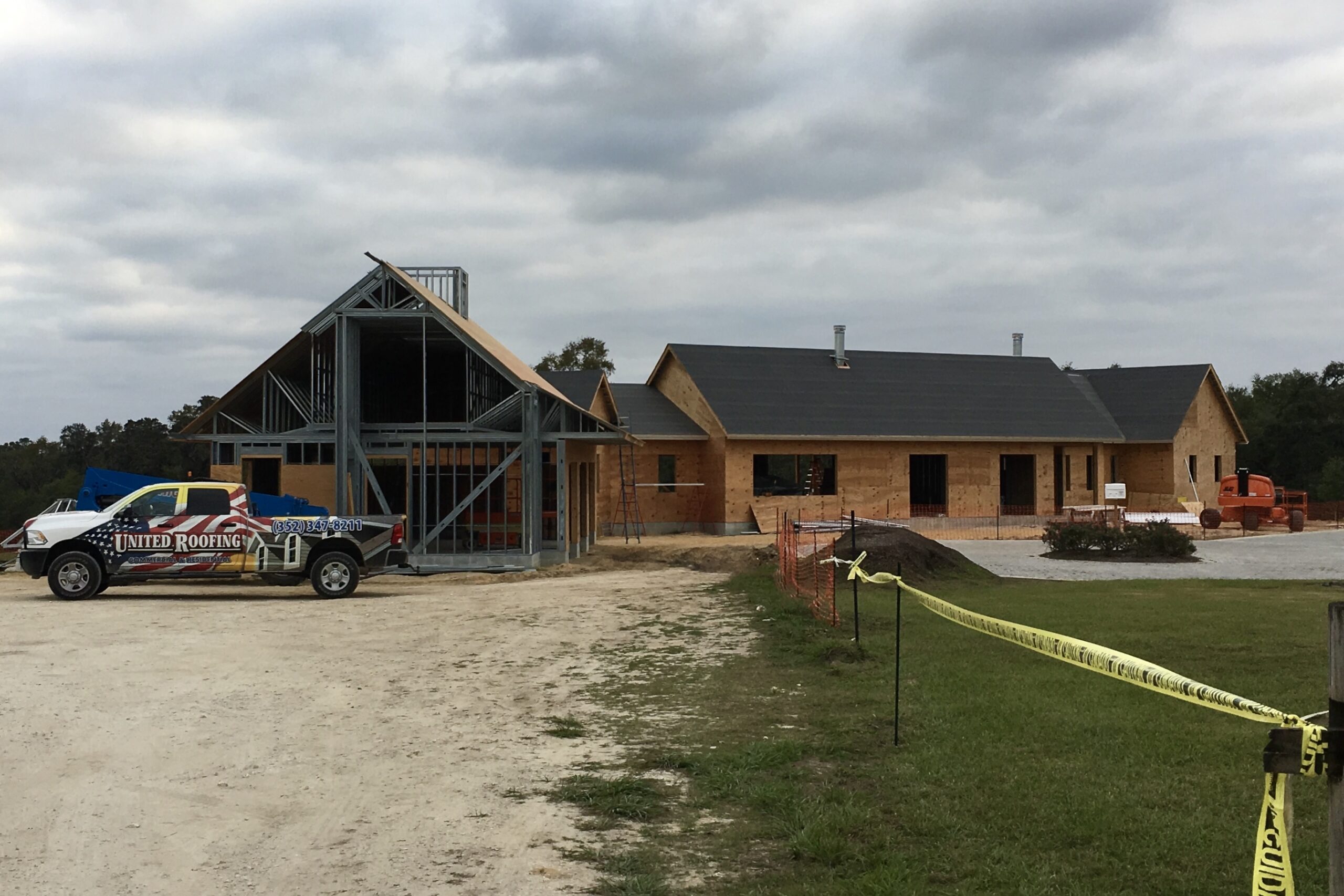 United Roofing team expertly installing a commercial roof in Ocala, FL